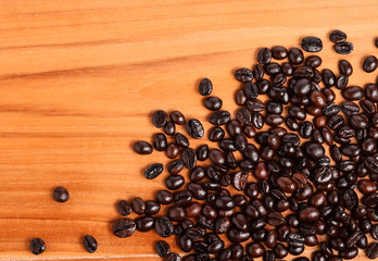 Coffee beans on  wooden background
