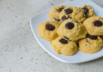 Cookie in dish on mulberry paper selective focus