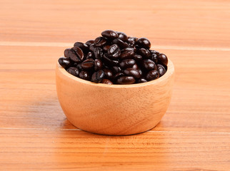 Coffee beans on  wooden background