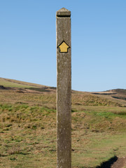 Single signpost without location. Picture taken on the cornish SW Coast Path between Port Isaac and Polzeath.