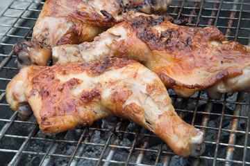 Roasted chicken on grill