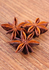 Star anise spice on wooden table