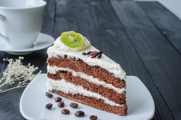 chocolate cake in dish on wooden