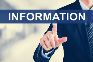 Businessman hand touching INFORMATION tab on virtual screen