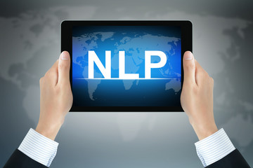 NLP letters (or Neuro Linguistic Programming) on tablet pc screen