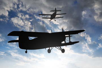 engine airplane flying at sunset