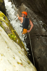 Experience thrilling canyoning adventures on Pucayacu River Canyon near Baños,Ecuador,with breathtaking natural landscapes.