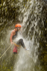 Experience the thrill of canyoning in Banos,Ecuador on the Pucayacu River Canyon,surrounded by...