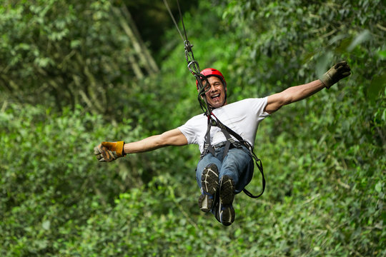 zip line ziplin adventure man adrenalin adult forest sports entertainment sport mature man on zipline ecuadorian andes zip line ziplin adventure man adrenalin adult forest sports entertainment sport