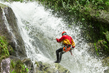 A thrilling descent down a canyon in Banos, Ecuador, as adrenaline junkies resist the rushing water...