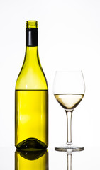 wine glass and bottle of white wine