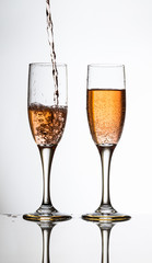 pouring champagne into a glass