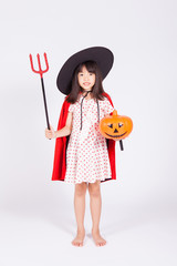 little girl in black hat  with halloween pumpkin