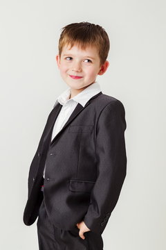 Little boy in a business suit 