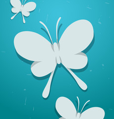 Vector butterflies. Image of white butterflies as the applique of paper on a blue background.