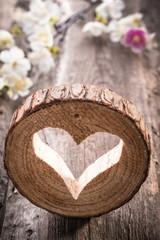 Light  heart on rustic wooden background
