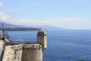 Fototapeta na wymiar Monaco coast, Tower on the waterfront of the Prince's Palace, Cote d'Azur