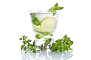 small glass of mojito with  ice mint and lime on white background