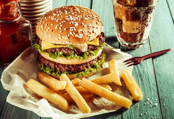 American double cheeseburger with French fries