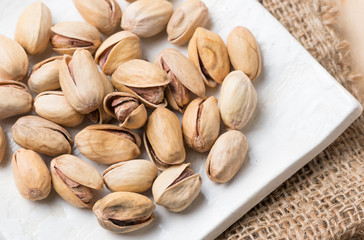 pistachio nut on wood background
