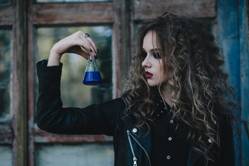 Vintage witch with elixir in hand