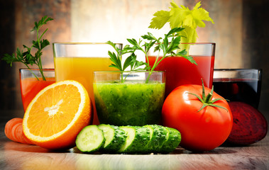 Glasses with fresh organic vegetable and fruit juices