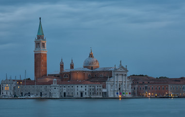 island of San Giorgio Maggiore and the church of the same name with a belltower, Venice, in evening twilight