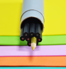 pencil in circle grey box on color foam rubber board overlay