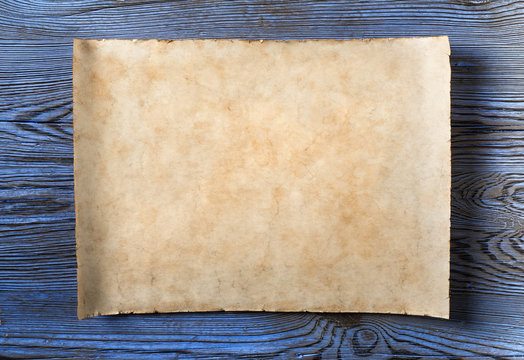 old parchment on blue wood