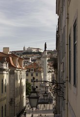 Pedro IV column in Rossio square viewed from the top of Calcada do Carmo in Lisbon, Portugal