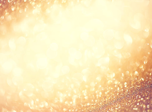 Golden abstract defocused background with blinking stars