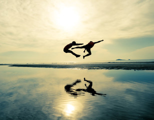 silhouette of men in funny actions