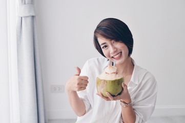 Asian cute woman lifestyle in white room