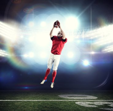 Composite image of american football player catching football