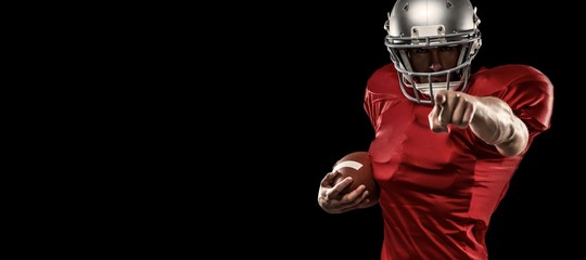 American football player pointing the camera