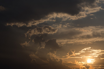 colorful sunset sky background with clouds and sun light