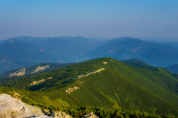 Naklejka premium Cudowna sceneria w górach w słoneczny dzień.