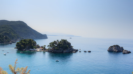 Fototapeta premium Seascape with mountains, islands with blue sky and sea.