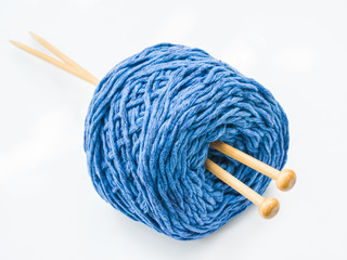 Blue kitting yarn isolated on white background