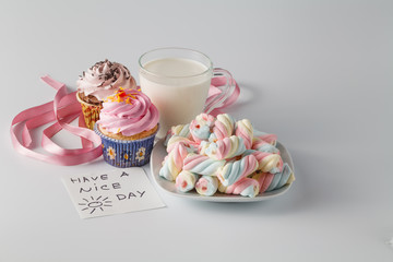 Heap of colored sweets on white background