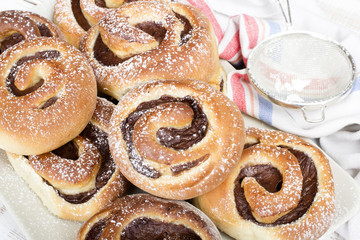 Homemade cream buns with chocolate