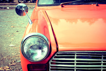 close-up headlight of colourful classic car