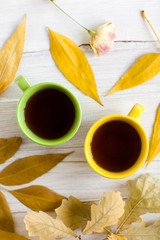Two cups of tea on a wooden background