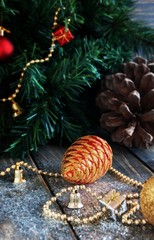 Christmas decorations on a background of trees and cones