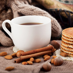 Hot drink, cinnamon and nuts