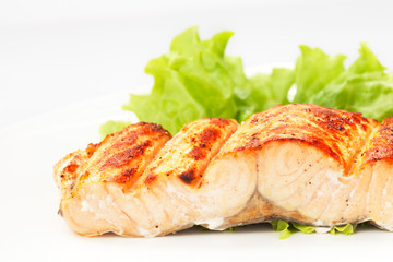 grilled salmon on white plate