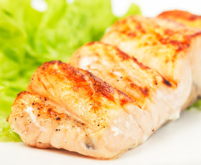 grilled salmon on white plate