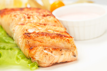 grilled salmon on white plate
