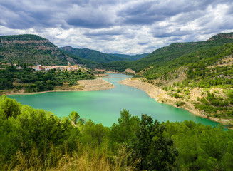 Stunning view of Puebla de Arenoso and Mijares river, Spain.