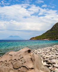 Filicudi island pebble shoreline, Aeolian islands, Italy. - 94156914